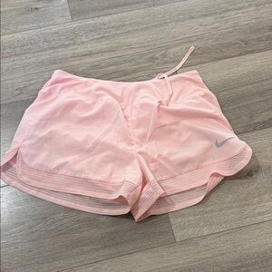 Nike Women’s Light Pink Athletic Shorts with Swoosh